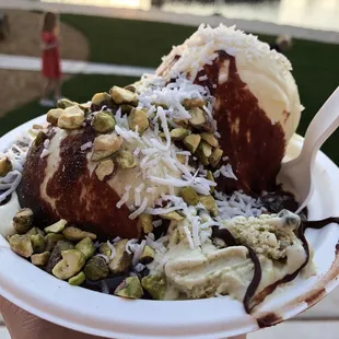 Pistachio &amp; lemon with ganache, coconut, &amp; pistachios