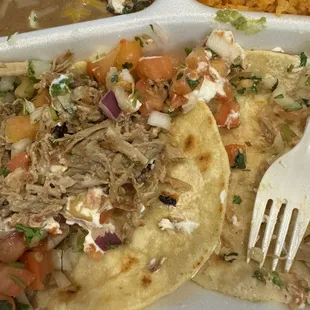 I found a fly in my carnitas street tacos(black thing in the middle) I had to throw away the whole plate. Never again!