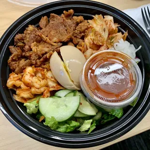 Fresh bowl w/spicy pork, hard boiled egg, Kim chi and original sauce