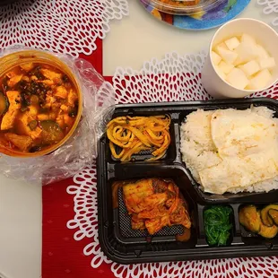a meal in a plastic container on a table