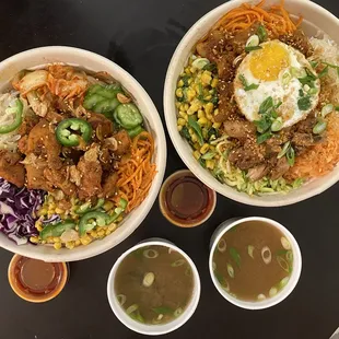 Firecracker pork bowl (right), spicy chicken bowl (left), signature red sauce, miso soup