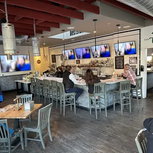 people sitting at the bar