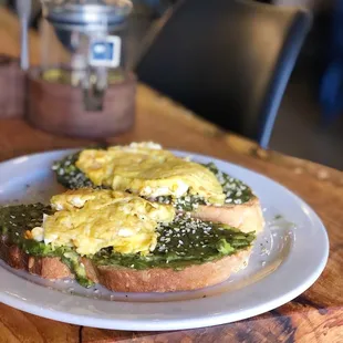 Avocado toast with scrambled egg on top