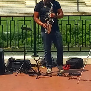 Great jazz musician filling the neo-claaaic air with smooth sax jazz.