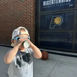 My son taking a water break
