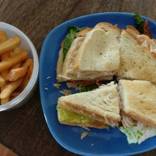 Turkey club with fries.