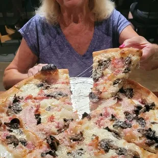 Dee gets the first slice