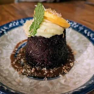 Purple Rice dessert. $10.90. Purple sticky rice, fresh mango, coconut custard, and palm sugar tamarind caramel sauce.