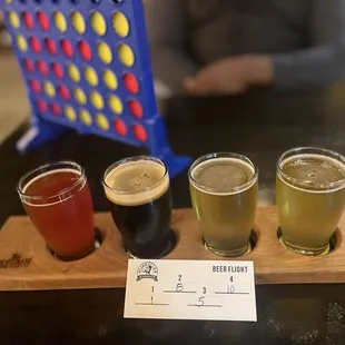 a beer flight with four different beers
