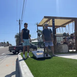 Our group enjoying the cornhole boards