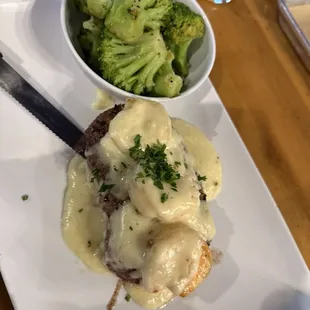 Surf'n Turf steak with shrimp covered in Alfredo Sauce with steamed broccoli. Was excellent!