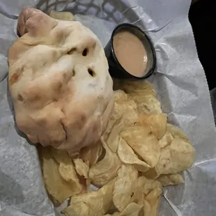 Thai bierock with peanut sauce and chips. So so good!