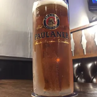 a glass of beer on a table