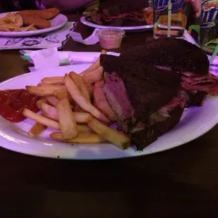 Reuben burger with steak fries