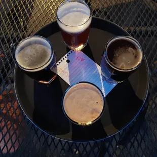 four beers on a table
