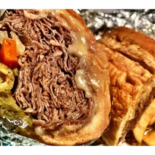 Dipped Italian Beef w/Sweet &amp; Hot Peppers and Cheese. Meaty Juicy Pretty Good! Big Al&apos;s Nice Quick Service!Clean Place!Good Food! Cool!