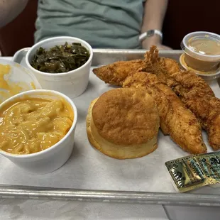 3 chicken strip Meal. Collards, Mac n cheese, biscuit and homemade sauce