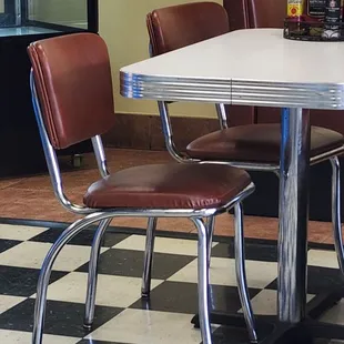Their chairs and tables are heavy and sturdy like they are from a bygone era.