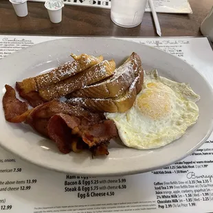 French toast w/ eggs over medium &amp; bacon from return visit Sunday, 12/15/2024