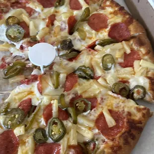 Pepperoni,pineapple,and jalapeño well done!! Soooo good!!!