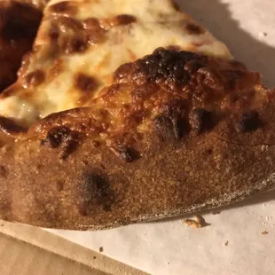 Half the pizza way over cooked, I'd call it burnt.