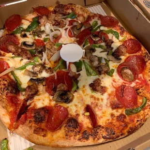 Pepperoni, Sausage, Mushroom, and Pepper Pizza