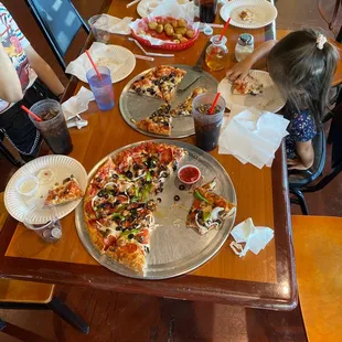 Great pizza! Fizzing refreshing soda!!! A happy family