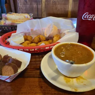 Gumbo, bacon wrapped shrimp, sausage