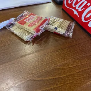 a coke and crackers on a table