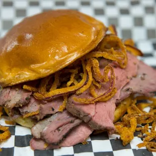 Smoked Tri-tip sandwich with crispy haystack onions