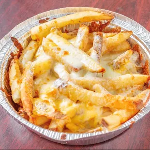 a pie with cheese on top