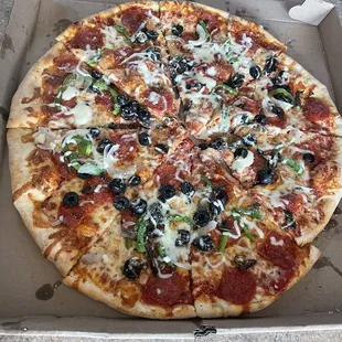 This is NOT a single pizza, but put together from different pies