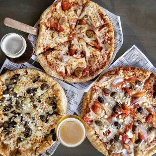 two pizzas and a beer