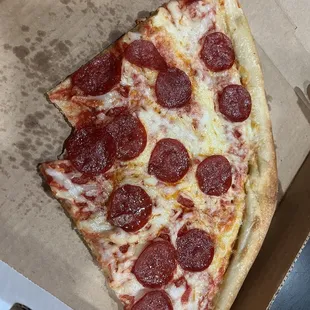 Pepperoni slice with some cheese