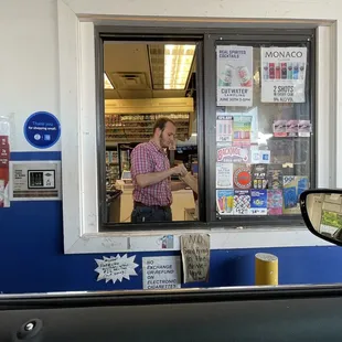a man in a store window