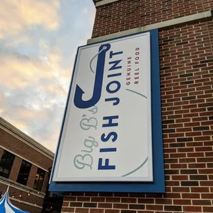 Outside. Storefront sign. Located in the Gateway mixed-use development on Roswell Road ITP.