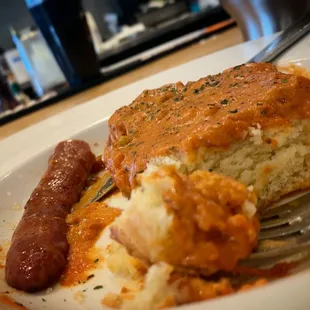 Biscuits w/ Tomato Gravy plus Andouille sausage