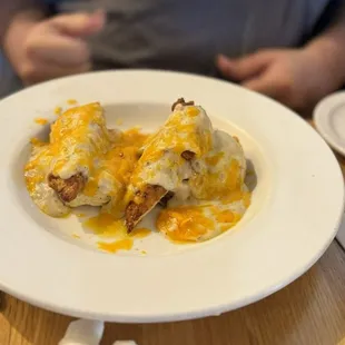 Biscuits with chicken cheese and gravy