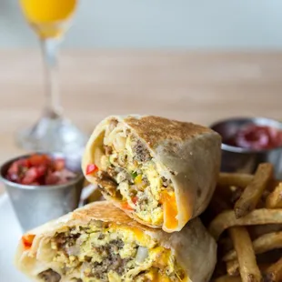 a breakfast burrito and fries