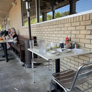 Empty tables waiting to be cleaned off