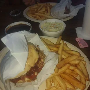 Great food pulled pork sandwich fries with coleslaw