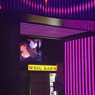 a neon sign for a big bar
