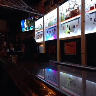 Halloween decor, far side of bar.