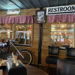 a motorcycle parked in front of a restaurant
