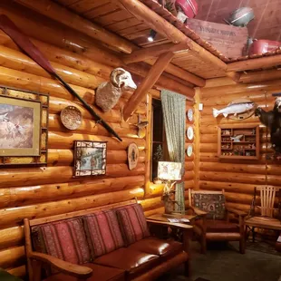 the living room of a log cabin
