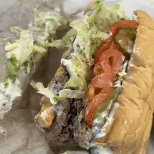 Half a roast beef po-boy with Swiss, dressed. 10/2024