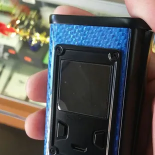 a hand holding a lighter