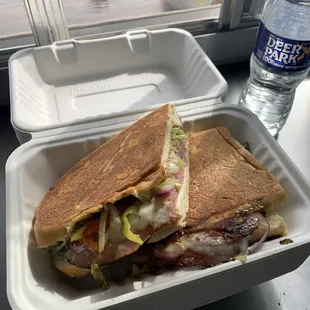 a sandwich in a styrofoam container