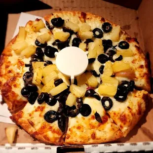 Black olives and pineapple with creamy garlic sauce.  Absolutely delicious!