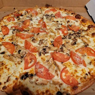 a whole pizza in a box